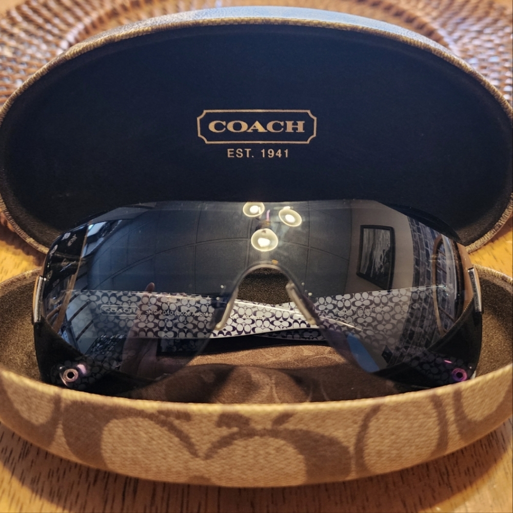 Coach Black Sunglasses with Navy Blue Stems.